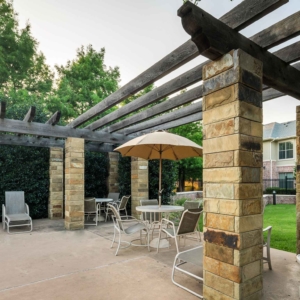 Arbor and patio seating at Villas