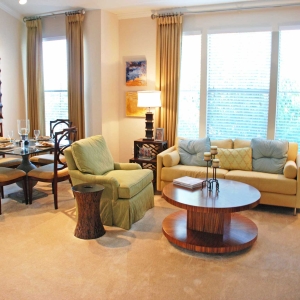 open living and dining area in model home at villas